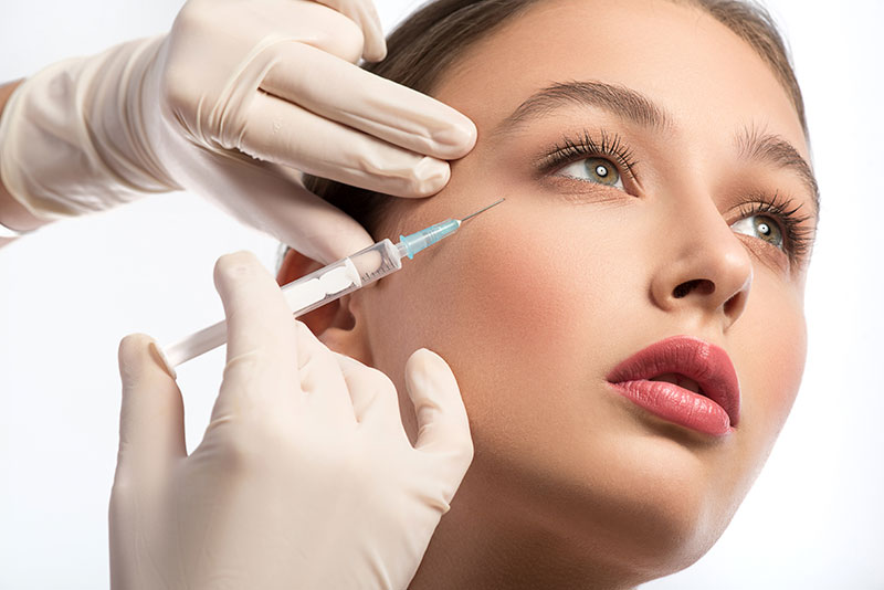 Woman Receiving Injectable Treatment